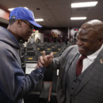 Eric Bieniemy, right, greets Washington Commanders wide receiver Terry McLaurin, left, after being introduced as the new offensive coordinator and assistant head coach of the Commanders after an NFL football press conference in Ashburn, Va., Thursday, Feb. 23, 2023. (AP Photo/Luis M. Alvarez)