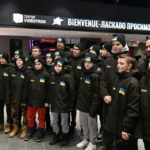 FILE -  Ukrainian peewee hockey team players and coaches pose for a group photo as they arrive, Wednesday, Feb. 1, 2023 at the Videotron Centre in Quebec City. The Ukraine team will compete at the Quebec international peewee hockey tournament. (Jacques Boissinot/The Canadian Press via AP, File)