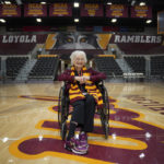 
              Sister Jean Dolores Schmidt, the Loyola University men's basketball chaplain and school celebrity, sits for a portrait in The Joseph J. Gentile Arena, on Monday, Jan. 23, 2023, in Chicago. The beloved Catholic nun captured the world's imagination and became something of a folk hero while supporting the Ramblers at the NCAA Final Four in 2018. (AP Photo/Jessie Wardarski)
            