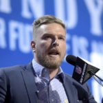 
              FILE - Former Indianapolis Colts player Pat McAfee announces the Colts' third round pick at the NFL football draft, April 26, 2019, in Nashville, Tenn. Retired NFL player Brett Favre filed a lawsuit against McAfee on Thursday, Feb. 9, 2023. The lawsuit accuses McAfee of defaming Favre in public discussions over misspending of welfare money in Mississippi.(AP Photo/Gregory Payan, File)
            