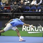 Francisco Cerundolo of Argentina hits a return against Otto Virtanen of Finland  during their singles match of the 2023 tennis Davis Cup Finals qualifier between Finland and Argentina in Espoo, Finland, on Saturday, Feb. 4, 2023. (Emmi Korhonen/Lehtikuva via AP)