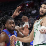 Detroit Pistons center Isaiah Stewart left, and Boston Celtics forward Jayson Tatum (0) watch the ball go out of bounds during the first half of an NBA basketball game, Monday, Feb. 6, 2023, in Detroit. (AP Photo/Carlos Osorio)