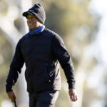 
              Tiger Woods walks off the fifth green during the pro-am of the Genesis Invitational golf tournament at Riviera Country Club, Wednesday, Feb. 15, 2023, in the Pacific Palisades area of Los Angeles. (AP Photo/Ryan Kang)
            
