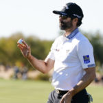 
              Adam Hadwin acknowledges the gallery on the ninth hole during the first round of the Phoenix Open golf tournament Thursday, Feb. 9, 2023, in Scottsdale, Ariz. Hadwin finished at five under par and is tied for the lead. (AP Photo/Darryl Webb)
            
