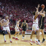 
              Purdue's Zach Edey (15) shoots over Indiana's Trayce Jackson-Davis (23) during the first half of an NCAA college basketball game, Saturday, Feb. 4, 2023, in Bloomington, Ind. (AP Photo/Darron Cummings)
            