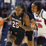 
              South Carolina guard Raven Johnson (25) drivdes past Mississippi guard Destiny Salary (10) during the first half of an NCAA college basketball game in Oxford, Miss., Sunday, Feb. 19, 2023. (AP Photo/Rogelio V. Solis)
            