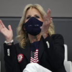 
              FILE - First Lady of the United States Jill Biden watches the swimming competition at the 2020 Summer Olympics, July 24, 2021, in Tokyo. (AP Photo/Matthias Schrader, File)
            