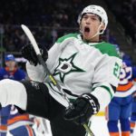 
              FILE -  Dallas Stars' Jason Robertson celebrates after scoring a goal during the first period of an NHL hockey game against the New York Islanders on Jan. 10, 2023, in Elmont, N.Y. The NHL All Star festivities on Feb. 3 and 4, 2023, in South Florida are a showcase of the league's next generation of stars, led by Robertson, New Jersey Devil's Jack Hughes and Buffalo's Tage Thompson. (AP Photo/Frank Franklin II, File)
            