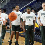 Michigan State University basketball members practice before an NCAA college basketball game against Michigan, Saturday, Feb. 18, 2023, in Ann Arbor, Mich. (AP Photo/Carlos Osorio)