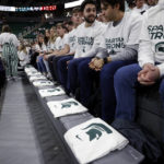 
              T-shirts are placed in the front row of the Breslin Center for the three killed and five injured Michigan State students before an NCAA college basketball game between Indiana and Michigan State on Tuesday, Feb. 21, 2023, in East Lansing, Mich. (AP Photo/Al Goldis)
            