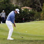 
              Patrick Cantlay chips onto the fifth green during the third round of the Genesis Invitational golf tournament at Riviera Country Club, Saturday, Feb. 18, 2023, in the Pacific Palisades area of Los Angeles. (AP Photo/Ryan Kang)
            