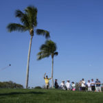 
              Sungjae Im, left, of South Korea, tees off on the 11th hole in the first round of the Honda Classic golf tournament, Thursday, Feb. 23, 2023, in Palm Beach Gardens, Fla. (AP Photo/Rebecca Blackwell)
            