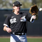 
              Chicago White Sox starting pitcher Mike Clevinger (52) works out during a spring training baseball practice, Wednesday, Feb. 15, 2023, in Phoenix. (AP Photo/Matt York)
            