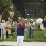 Bill Murray tosses his club after hitting out of a bunker by the second green of the Pebble Beach Golf Links during the third round of the AT&T Pebble Beach Pro-Am golf tournament in Pebble Beach, Calif., Saturday, Feb. 4, 2023. (AP Photo/Eric Risberg)