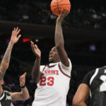 
              St. John's forward David Jones (23) shoots the ball during the second half of an NCAA college basketball game against Providence, Saturday, Feb 11, 2023 in New York. (AP Photo/Bryan Woolston)
            
