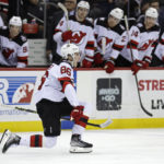 New Jersey Devils center Jack Hughes reacts after scoring a goal against the Philadelphia Flyers during the second period of an NHL hockey game Saturday, Feb. 25, 2023, in Newark, N.J. (AP Photo/Adam Hunger)