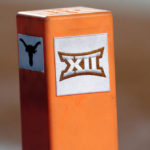 
              FILE - The Big 12 conference logo is seen on a pylon during the first half of an NCAA college football game between Texas and Southern California in Austin, Texas, Sept. 15, 2018. Texas and Oklahoma are heading to the Southeastern Conference in 2024, a year earlier than originally planned, after Big 12 officials cleared the way Thursday, Feb. 9, 2023, for the storied programs to exit their league. (AP Photo/Eric Gay, File)
            
