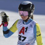 
              Ukraine's Anastasiia Shepilenko waves at the finish area of an alpine ski, women's World Championships super G, in Meribel, France, Wednesday, Feb. 8, 2023. (AP Photo/Marco Trovati)
            