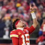 
              FILE - Kansas City Chiefs quarterback Patrick Mahomes reacts before the NFL AFC Championship playoff football game against the Cincinnati Bengals, Sunday, Jan. 29, 2023, in Kansas City, Mo. Public display of faith is nothing new in football or sports.(AP Photo/Charlie Riedel, File)
            
