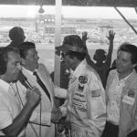 
              FILE - President Ronald Reagan congratulates stock car driver Richard Petty, who won the Firecracker 400 race at the Daytona International Speedway in Daytona Beach, Fla, July 4, 1984.  (AP Photo/Ira Schwarz, File)
            