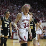Indiana's Grace Berger (34) reacts after making a basket and getting fouled during the second half of an NCAA college basketball game against Purdue, Sunday, Feb. 19, 2023, in Bloomington, Ind. (AP Photo/Darron Cummings)