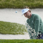 Keith Mitchell follows his shot out of a bunker onto the 17th green of the Pebble Beach Golf Links during the third round of the AT&T Pebble Beach Pro-Am golf tournament in Pebble Beach, Calif., Sunday, Feb. 5, 2023. (AP Photo/Godofredo A. Vásquez)