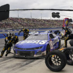 Kyle Busch (8) makes a pit stop during a NASCAR Cup Series auto race at Auto Club Speedway in Fontana, Calif., Sunday, Feb. 26, 2023. (AP Photo/Jae C. Hong)