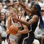 
              South Carolina's Aliyah Boston, right, pressures UConn's Dorka Juhasz in the first half of an NCAA college basketball game, Sunday, Feb. 5, 2023, in Hartford, Conn. (AP Photo/Jessica Hill)
            