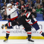 
              Washington Capitals left wing Alex Ovechkin (8) and Buffalo Sabres defenseman Mattias Samuelsson (23) collide during the second period of an NHL hockey game, Sunday, Feb. 26, 2023, in Buffalo, N.Y. (AP Photo/Jeffrey T. Barnes)
            