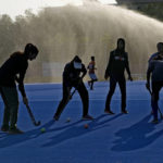 
              Female field hockey players of a local club attend a training session, in Karachi, Pakistan, Sunday, Nov. 13, 2022. There is only one sport that matters in Pakistan and that's cricket, a massive money-making machine. But minors sports like rugby are struggling to get off the ground due to lack of investment and interest, stunting their growth at home and chances of success overseas. Even previously popular sports like squash and field hockey, which Pakistan dominated for decades, can't find their form.(AP Photo/Fareed Khan)
            