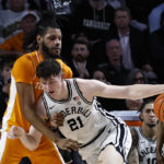 
              Vanderbilt forward Liam Robbins (21) is defended by Tennessee guard Jahmai Mashack during the second half of an NCAA college basketball game Wednesday, Feb. 8, 2023, in Nashville, Tenn. (AP Photo/Wade Payne)
            