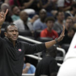 Detroit Pistons head coach Dwane Casey, left, calls out instructions during the first half of an NBA basketball game against the Orlando Magic, Thursday, Feb. 23, 2023, in Orlando, Fla. (AP Photo/Phelan M. Ebenhack)