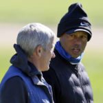 
              Tiger Woods, right, talks to PGA Commissioner Jay Monahan on the 15th hole during the pro-am of the Genesis Invitational golf tournament at Riviera Country Club, Wednesday, Feb. 15, 2023, in the Pacific Palisades area of Los Angeles. (AP Photo/Ryan Kang)
            