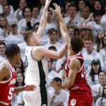 
              Michigan State's Jaxon Kohler, left, shoots against Indiana's Trayce Jackson-Davis during the first half of an NCAA college basketball game, Tuesday, Feb. 21, 2023, in East Lansing, Mich. (AP Photo/Al Goldis)
            