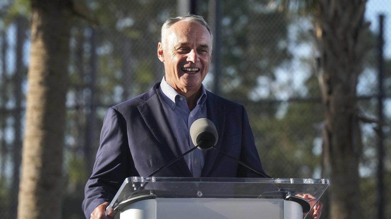 MLB Commissioner Rob Manfred speaks to the media and answers questions during baseball spring train...