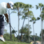 
              Eric Cole hits from the third fairway during the third round of the Honda Classic golf tournament, Saturday, Feb. 25, 2023, in Palm Beach Gardens, Fla. (AP Photo/Lynne Sladky)
            