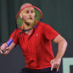 Denis Kudla of the USA gets ready to return the ball to Amir Milushev of Uzbekistan during a singles Davis Cup qualifier tennis match between Uzbekistan and the USA in Tashkent, Uzbekistan, Saturday, Feb. 4, 2023. The USA sweep into Davis Cup Finals with victory over Uzbekistan. (AP Photo)