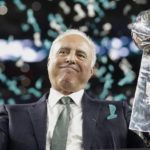 
              FILE - Philadelphia Eagles owner Jeffrey Lurie holds up the Vince Lombardi Trophy after the NFL Super Bowl 52 football game against the New England Patriots, Sunday, Feb. 4, 2018, in Minneapolis. The Eagles won 41-33. Lurie lost four conference title games and a Super Bowl before finally winning his first Lombardi Trophy.(AP Photo/Mark Humphrey, File)
            
