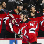 
              FILE - New Jersey Devils' Jack Hughes (86) celebrates with teammates after scoring a goal during the first period of an NHL hockey game against the Pittsburgh Penguins on Jan. 22, 2023, in Newark, N.J. The NHL All Star festivities on Feb. 3 and 4, 2023, in South Florida are a showcase of the league's next generation of stars, led by Hughes, Buffalo Sabres' Tage Thompson and Dallas Stars' Jason Robertson. (AP Photo/Frank Franklin II, File)
            