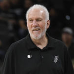 
              FILE - San Antonio Spurs head coach Gregg Popovich watches the action during the first half of an NBA basketball game against the Denver Nuggets, Nov. 7, 2022, in San Antonio. Popovich was announced Friday, Feb. 17, 2023, as being among the finalists for enshrinement later this year by the Basketball Hall of Fame. The class will be revealed on April 1. (AP Photo/Darren Abate, File)
            
