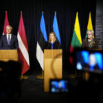 
              From left, Latvian Prime Minister Krisjanis Karins, Estonian Prime Minister Kaja Kallas and Lithuanian Prime Minister Ingrida Simonyte attend a joint news conference during their meeting in Tallinn, Estonia, Friday, Feb. 3, 2023. The prime ministers of the three Baltic countries meet in Tallinn to discuss, among other things, joint aid efforts for Ukraine. (AP Photo/Pavel Golovkin)
            