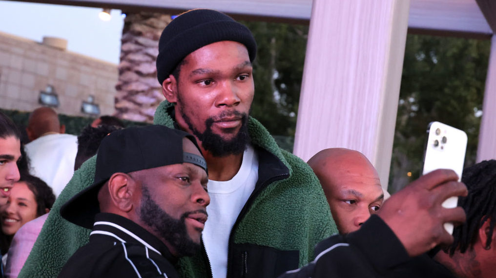 Kevin Durant (R) and guest attends Michael Rubin's 2023 Fanatics Super Bowl Party at the Arizona Bi...
