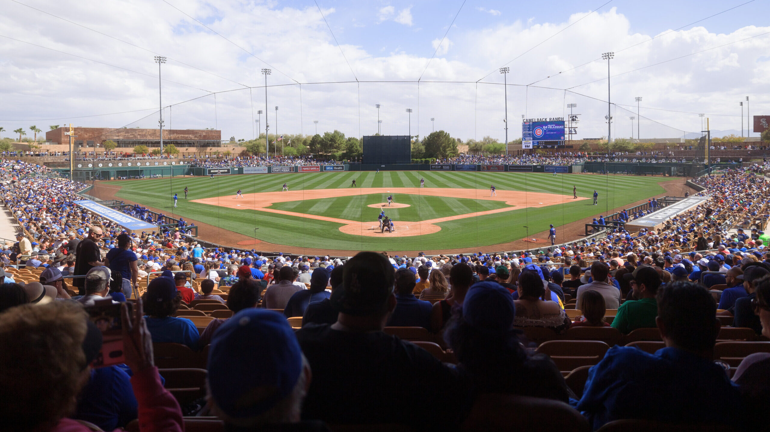 Fans fill Camelback Ranch during the MLB Spring Training baseball game between the Chicago Cubs and...