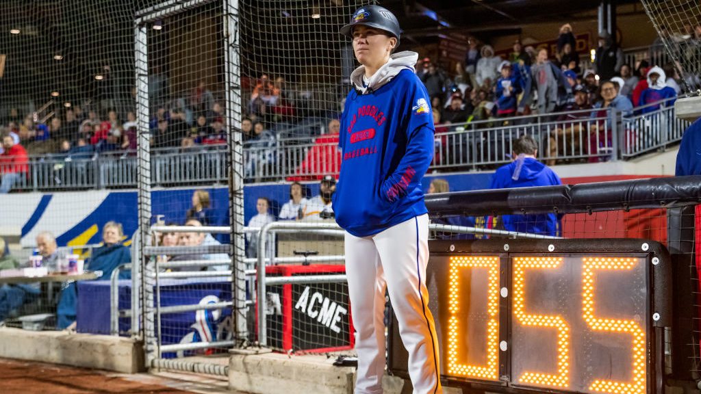 Coach Ronnie Gajownik of the Amarillo Sod Poodles stands on the field between innings during the ga...