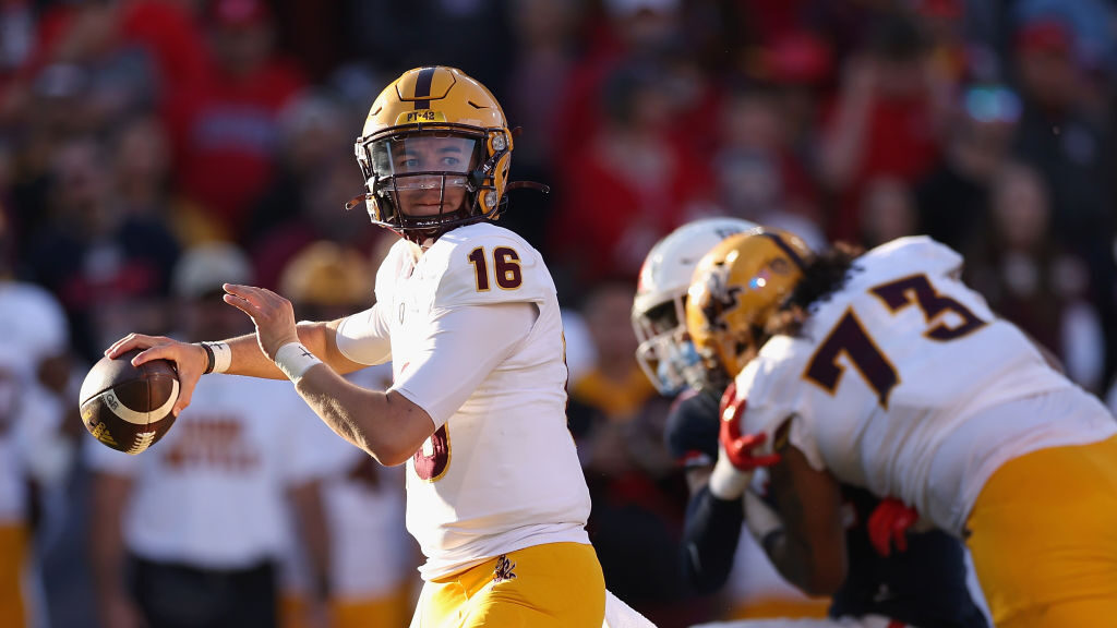 Quarterback Trenton Bourguet #16 of the Arizona State Sun Devils throws a pass during the second ha...