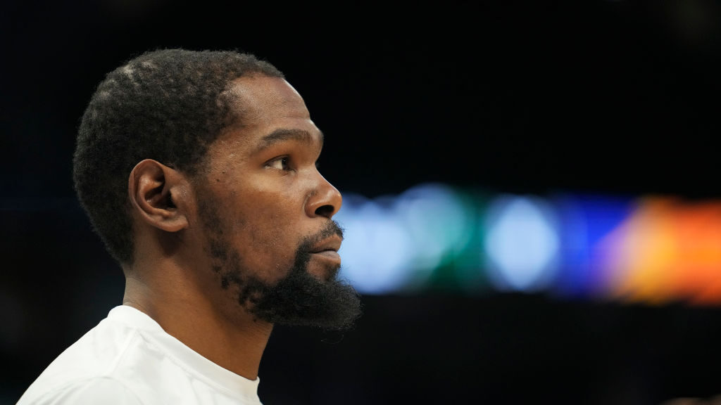 Kevin Durant scratched from Suns' home debut after slipping in