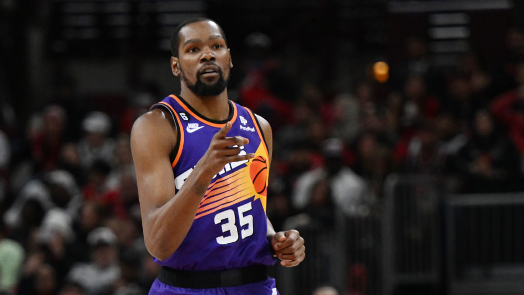 Kevin Durant #35 of the Phoenix Suns reacts after scoring in the second half against the Chicago Bu...