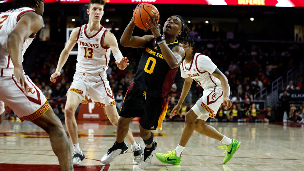 DJ Horne #0 of the Arizona State Sun Devils falls after being fouled during a game between the USC ...