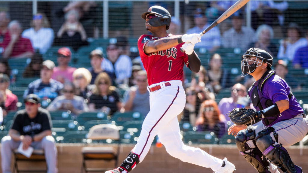 Kyle Lewis #1 of the Arizona Diamondbacks hits a home run during the first inning of the Spring Tra...