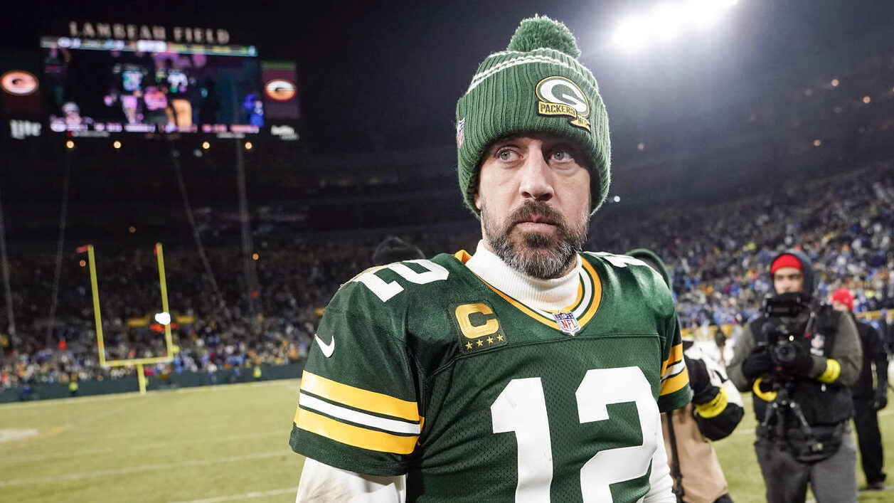 Green Bay Packers' Aaron Rodgers walks off the field after an NFL football game against the Detroit...